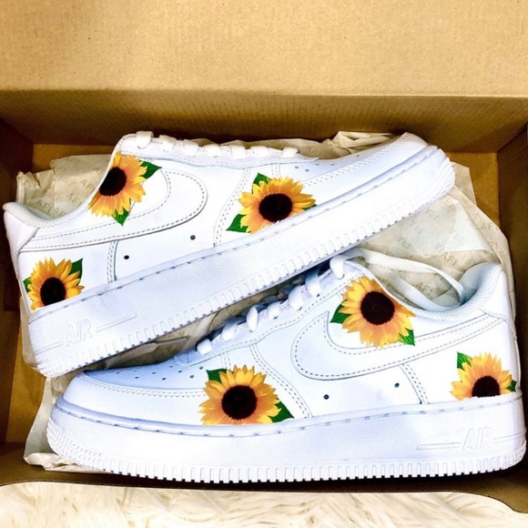 black nikes with sunflower design